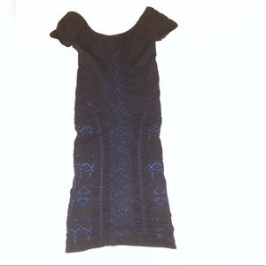Bebe black lace bodycon dress with blue underlay